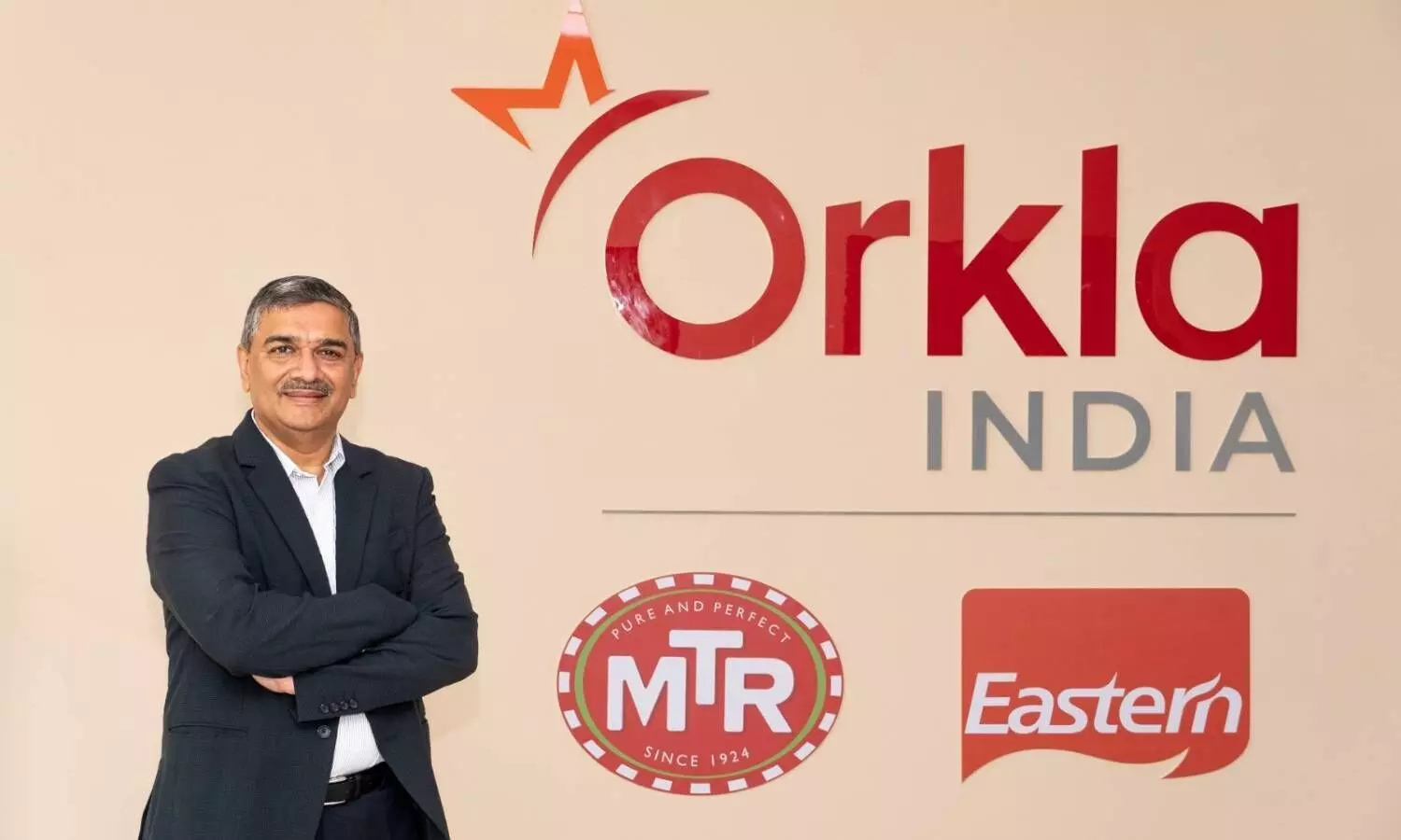 Sanjay Sharma, CEO, Orkla India & logo of mtr & Eastern