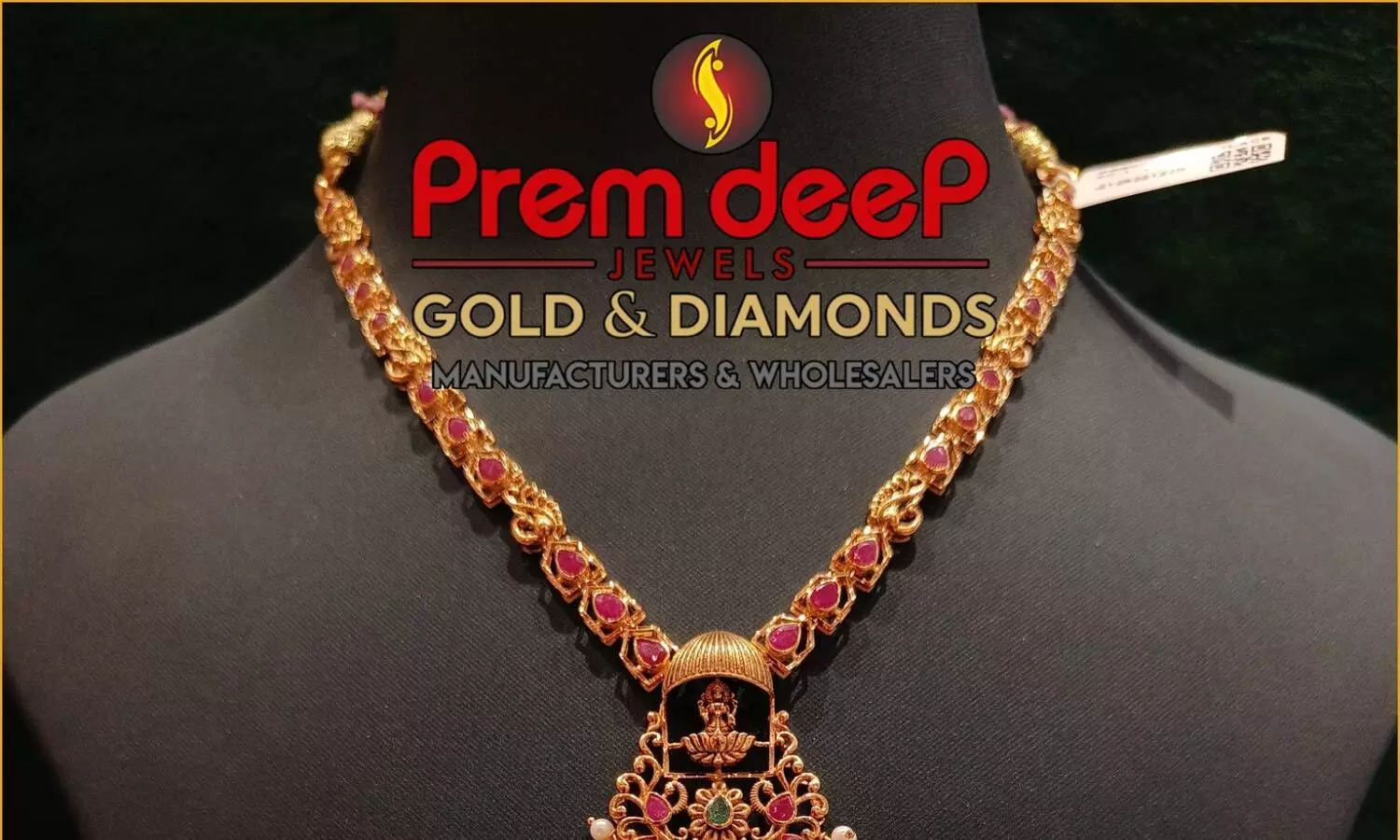 a gold diamond chain with letters saying premdeep gold and dimonds