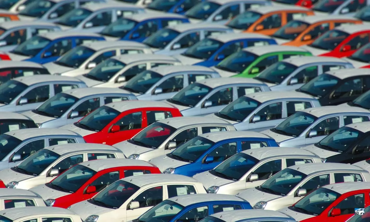 a number of cars parked in a parking lot