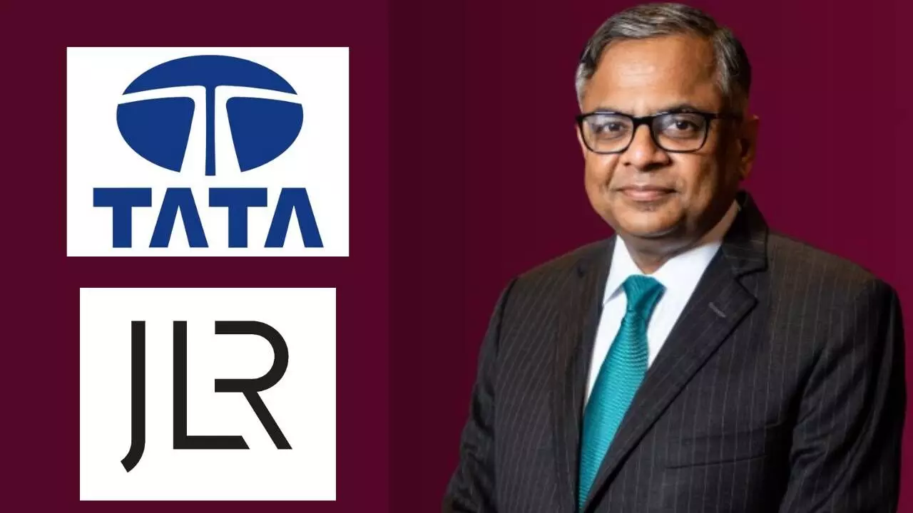 N.Chandrashekharan, Chairman, Tata Sons & logos of Tata Motors and JLR