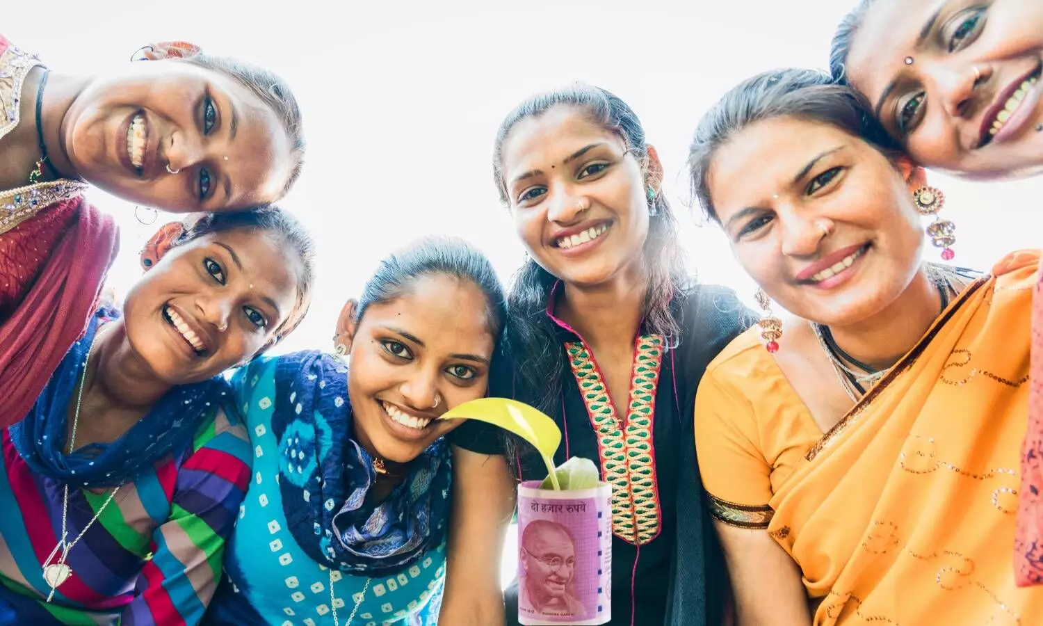 happy women with indian rupee