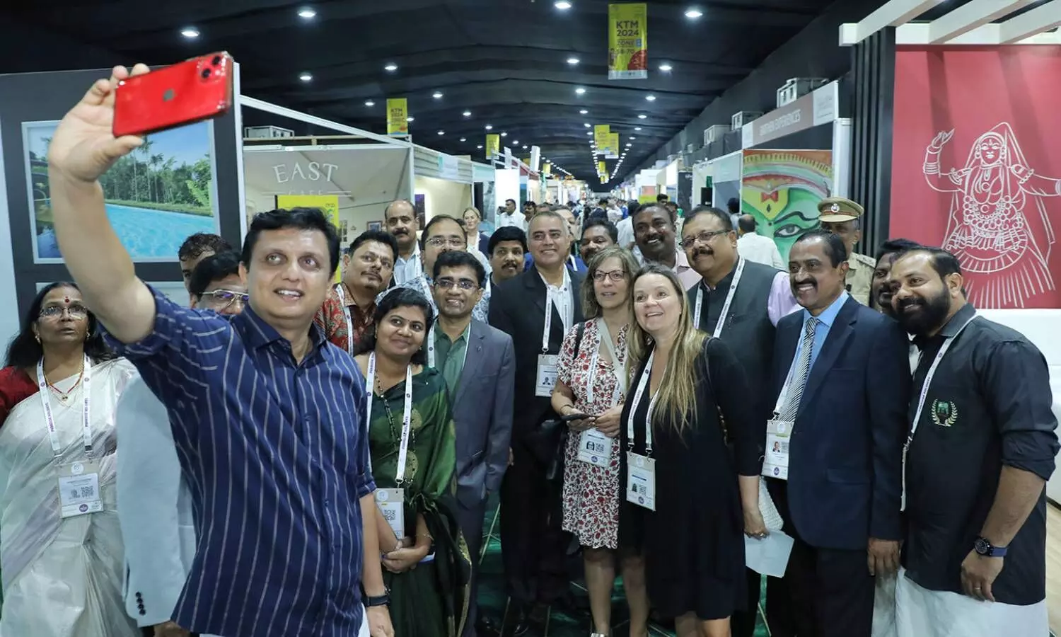 Tourism Minister PA Muhammad Riyas taking a selfie with the delegates at the Kerala Travel Mart (KTM) Expo.