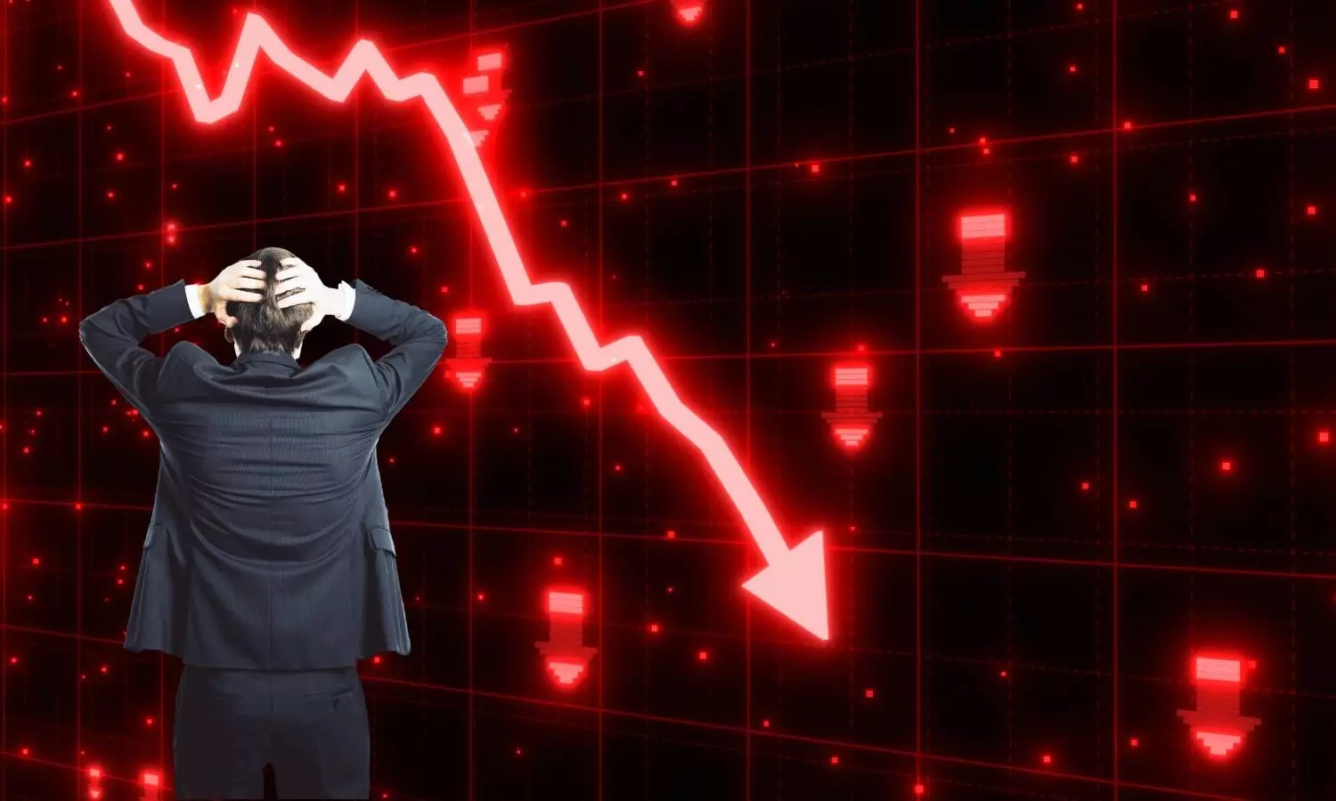 stock market crash one man holding hands on his head