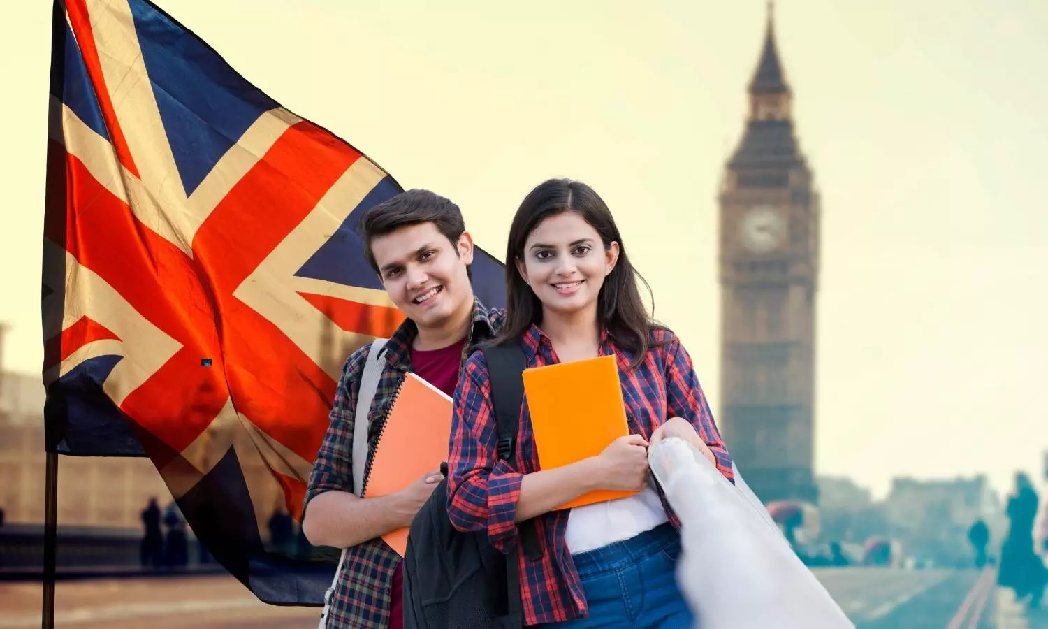 two indian students background uk flag