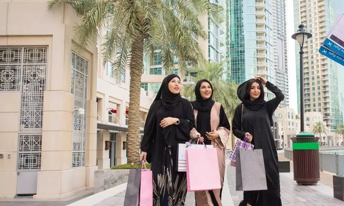 three women walking on the streets of Dubai